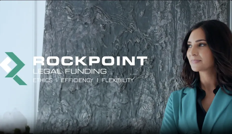 Rockpoint Legal Funding representative beside the company logo