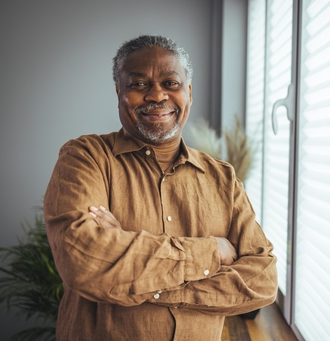 Portrait of a 60 year old black man. He just received pre-settlement funding from Rockpoint.