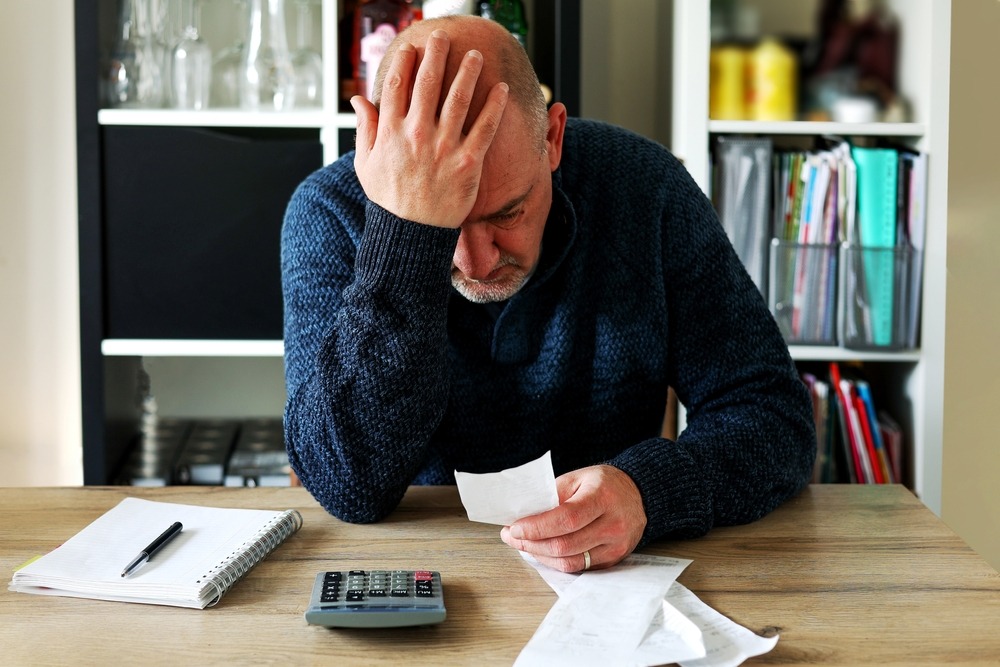 man upset to review his budget in Los Angeles