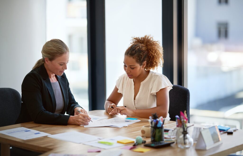 Attorney explains legal concepts to a client and presents lawsuit loan options